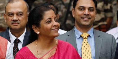 Finance Minister Nirmala Sitharaman (C) and Krishnamurthy Subramanian (R), chief economic adviser pose during a photo opportunity outside their office in parliament in New Delhi, India, July 5, 2019. Photo: Reuters/Anushree Fadnavis