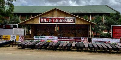 Wall of Remembrance, set up by the Kuki community with 100 coffins and pictures of those who died in the clashes. Photo: Yaqut Ali